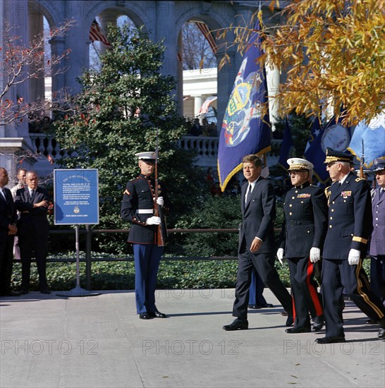 U.S. President John F. Kennedy walking to Tomb of the Unknown Soldier with Commandant of U.S. Marine Corps, General David M. Shoup, and Commanding General of the Military District of Washington, Major General Philip C. Wehle, during Veterans Day ceremonies, Arlington National Cemetery, Arlington, Virginia, USA, Cecil Stoughton, White House Photographs, November 11, 1963