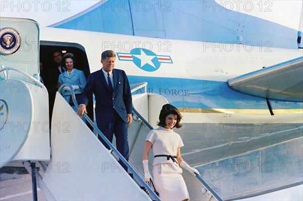 U.S. President John F. Kennedy and U.S. First Lady Jacqueline Kennedy exit Air Force One upon their arrival at Houston International Airport, Houston, Texas, USA, Cecil Stoughton, White House Photographs, November 21, 1963