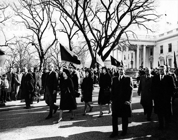 U.S. President Lyndon B. Johnson and U.S.  First Lady Lady Bird Johnson walking in U.S. President John F. Kennedy's funeral procession departing the White House for the Cathedral of St. Matthew the Apostle, Washington, D.C., USA, Abbie Rowe, White House Photographs, November 25, 1963