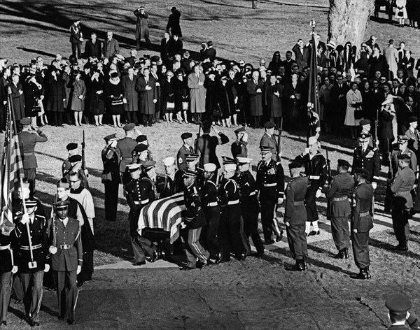 Honor guard pallbearers carrying flag-draped casket of U.S. President John F. Kennedy to gravesite, Arlington National Cemetery, Arlington, Virginia, USA, Abbie Rowe, White House Photographs, November 25, 1963