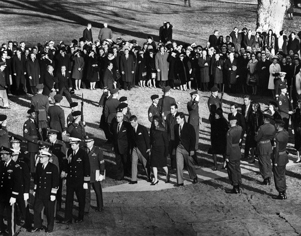 Kennedy family members: U.S. Attorney General Robert F. Kennedy, Jacqueline Kennedy, U.S. Senator Edward M. Kennedy, Rose Fitzgerald Kennedy, Steven Smith, Peter Lawford,  Jean Kennedy Smith, Eunice Kennedy Shriver, Patricia Kennedy Lawford, walk to the gravesite of  U.S. President John F. Kennedy for graveside services in the state funeral of President Kennedy, Arlington National Cemetery, Arlington, Virginia, USA, Abbie Rowe, White House Photographs, November 25, 1963