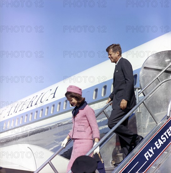 U.S. President John F. Kennedy and U.S. First Lady Jacqueline Kennedy descending stairs from Air Force One, Love Field, Dallas, Texas, USA, Cecil Stoughton, White House Photographs, November 22, 1963