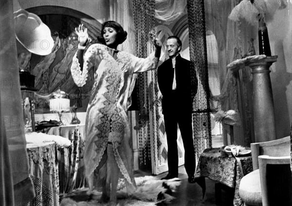 Teresa Graves, David Niven, on-set of the British film, "Vampira", USA title: "Old Dracula", Columbia-Warner Distributors, American International Pictures, 1974