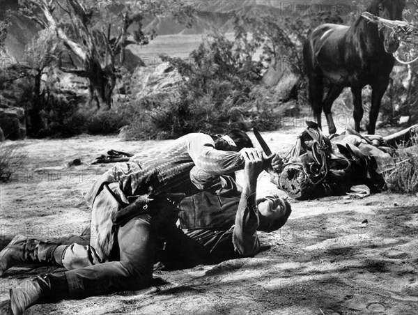 Rory Calhoun, on-set of the western film, "Apache Uprising", Paramount Pictures,