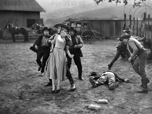 Jack Dougherty, Christian Frank, Betty Jewel, on-set of the silent western film, "Arizona Bound", Paramount Pictures, 1927