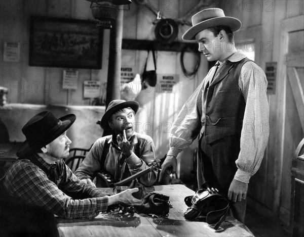 Dennis O'Keefe (standing right), on-set of the western film, "The Bad Man Of Brimstone", Loew's Inc., 1937