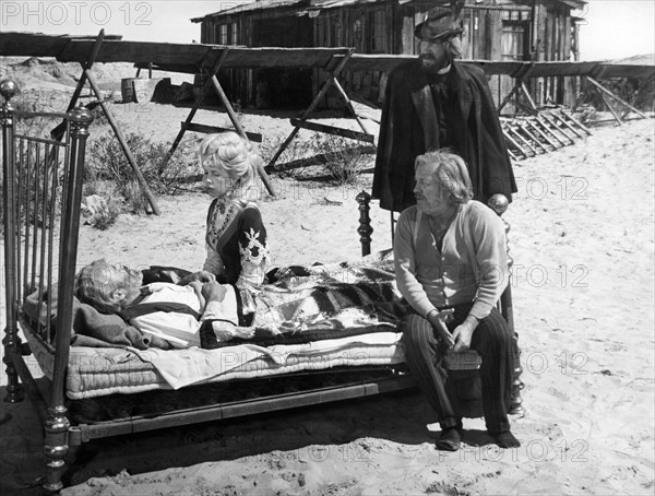 Jason Robards, Stella Stevens, David Warner, Strother Martin (seated), on-set of the western film, "The Battle Of Cable Hogue", Warner Bros., 1970