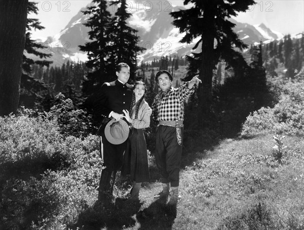 James Ellison, Jean Parker, Leo Carrillo, on-set of the western film, "The Barrier", Paramount Pictures, 1937