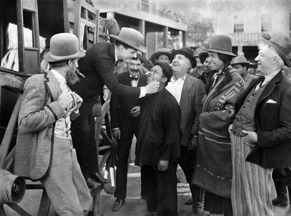 Forrest Stanley, James Gordon, on-set of the silent western film, "Beauty And The Bad Man", Producers Distributing Corporation, 1925