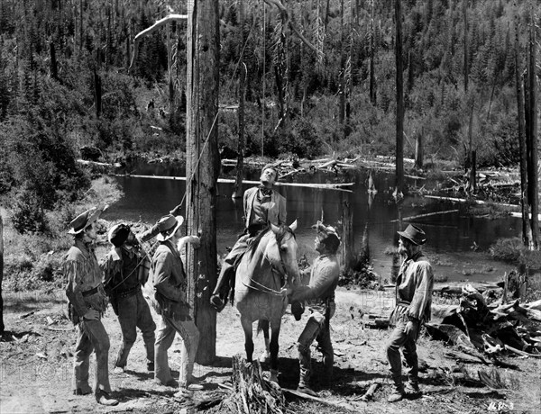 Arthur Kennedy (on horse), on-set of the western film, "Bend Of The River", Universal Pictures, 1952