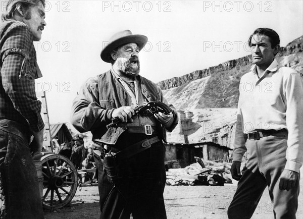 Chuck Connors, Burl Ives, Gregory Peck, on-set of the western film, "The Big Country", United Artists, 1958