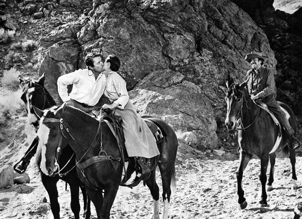 Gregory Peck, Jean Simmons, on-set of the western film, "The Big Country", United Artists, 1958