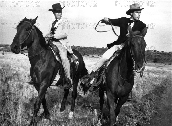 Jason Robards, Kevin McCarthy, on-set of the western film, "A Big Hand For The Little Lady", Warner Bros., 1966