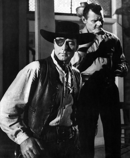 George Montgomery (foreground), Leo Gordon (rear), on-set of the western film, "Black Patch", Warner Bros., 1957