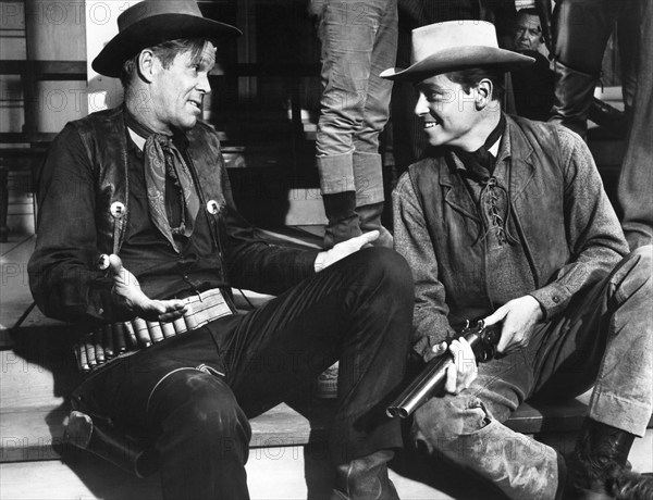 Dan Duryea (left), Peter Duryea (right), on-set of the western film, "The Bounty Killer", Embassy Pictures, 1965