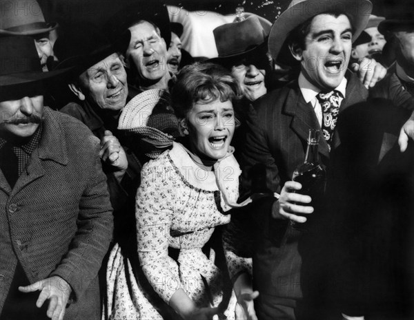 Maria Schell (center), on-set of the western film, "Cimarron", MGM, 1960