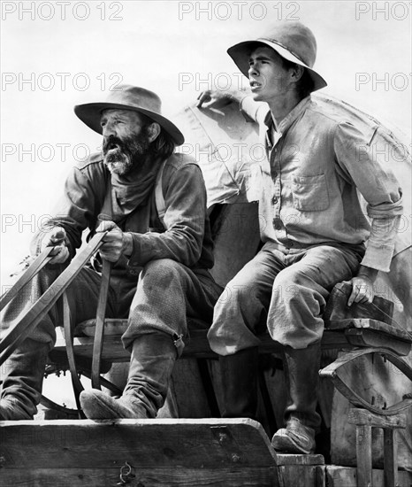 Raymond Guth (left), Gary Grimes (right), on-set of the western film, "The Culpepper Cattle Co.", 20th Century-Fox, 1972