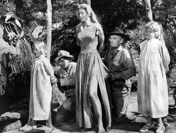 Glenn Ford (kneeling left), Barbara Babcock (standing center, Arthur Kennedy (kneeling right),  Jane Geffrey, on-set of the western film, "Day Of The Evil Gun", MGM, 1968