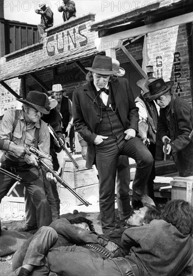 Richard Harris (standing center), on-set of the western film, "The Deadly Trackers", Warner Bros., 1973