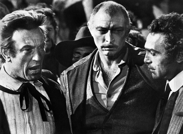 Lee Van Cleef (center) Luigi Pistilli (right), on-set of the Italian spaghetti western film, "Death Rides A Horse", Italian title: "Da uomo a uomo", United Artists, 1967