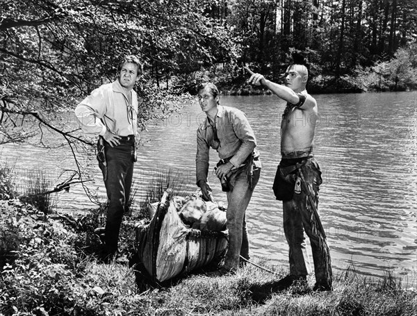 Forrest Tucker, Lex Barker, Carlos Rivas, on-set of the western film, "The Deerslayer", 20th Century-Fox, 1957