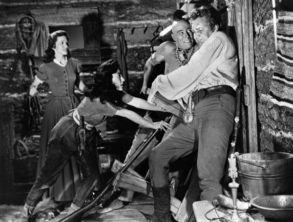 Cathy O'Donnell, Rita Moreno, Carlos Rivas, Forrest Tucker, on-set of the western film, "The Deerslayer", 20th Century-Fox, 1957