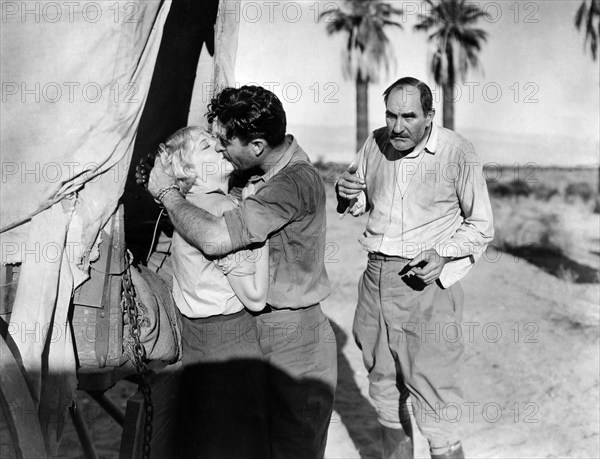 Mary Nolan, John Gilbert, Ernest Torrence, on-set of the film, "Desert Nights", MGM, 1929