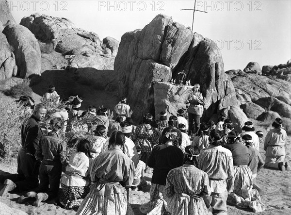 Group of Mission Indians in prayer, on-set of the western film, "Desert Pursuit", Monogram Pictures, 1952