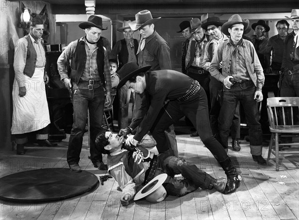 Bob Baker, Johnny Mack Brown, Jim Corey, Al Haskell, Johnny Luther, Charles Stevens, on-set of the western film, "Desperate Trails", 1939