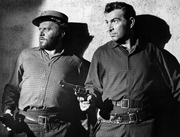 William Phillips (left), Stephen McNally (right), on-set of the western film, "Devil's, Canyon", RKO Radio Pictures, 1953