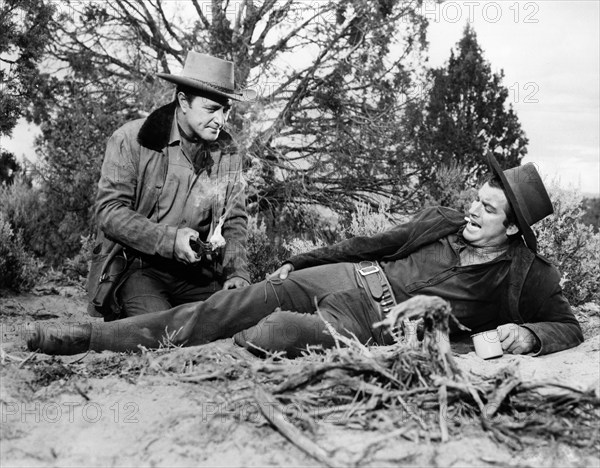 Tony Martin, John Bromfield, on-set of the western film, "Quincannon, Frontier Scout", United Artists, 1956