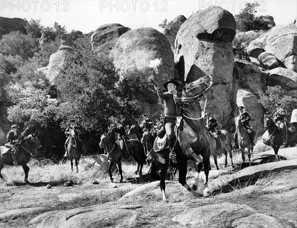 Don Kelly (foreground, center), on-set of the western film, "Frontier Uprising", United Artists, 1961