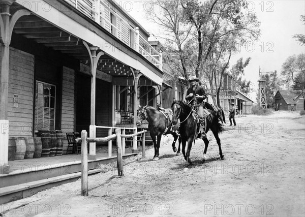 John Derek, on-set of the western film, "Fury At Showdown", United Artists, 1957