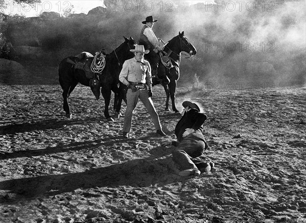 Jack Holt (standing),on-set of the western film, "The Gallant Legion, Republic Pictures, 1948