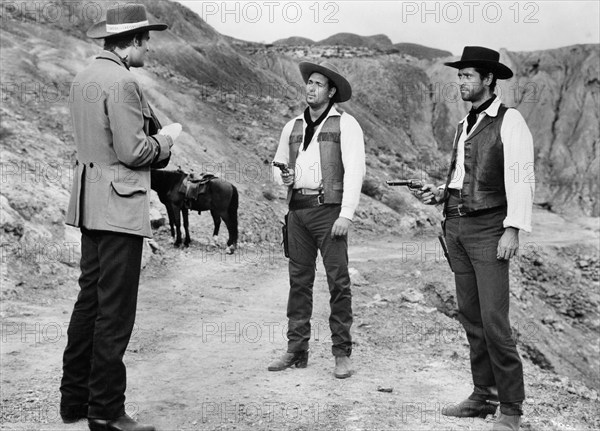 Robert Hundar, Aldo Sambrell, Fernando Bilbao, on-set of the Italian-Spanish western film, "Dollars For A Fast Gun", Italian title: "100.000 dollari per Lassiter", Spanish title: "La muerte cumple condena",