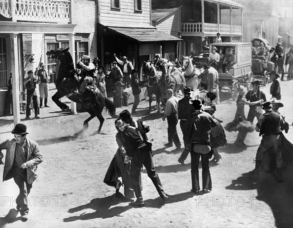 Street scene celebrating end of American Civil War, on-set of the western film, "The Fastest Guitar Alive", MGM, 1967