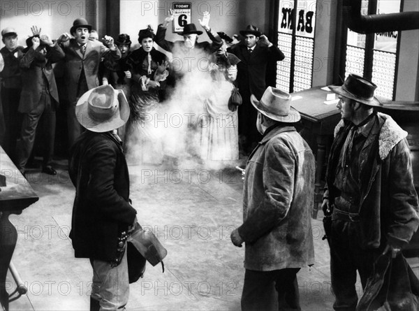 Noah Beery, Jr. (rear-view left), Broderick Crawford (rear-view center), John Dehner (rear-view right), on-set of the western film, "The Fastest Gun Alive", MGM, 1956