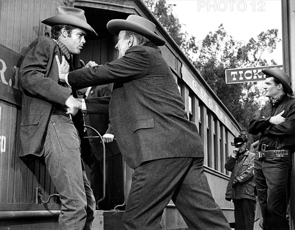 Doug McClure (left), on-set of the western TV series,  "The Virginian"  Season 1, Episode 30 "The Final Hour", NBC, 1963