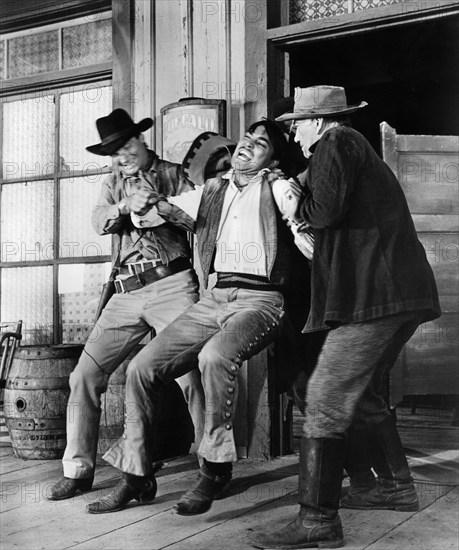 Valentin de Vargas (center), on-set of the western film, "The Firebrand", 20th Century-Fox, 1962