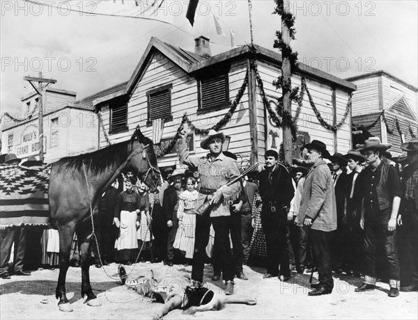 Stewart Granger (standing center with rifle), on-set of the western film, "Flaming Frontier", Warner Bros.-Seven Arts, 1968