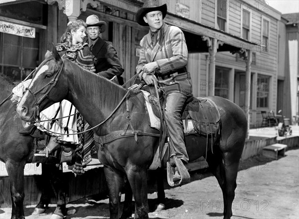 Tracey Roberts, Peter Graves, Ben Johnson, on-set of the western film, "Fort Defiance", United Artists, 1951