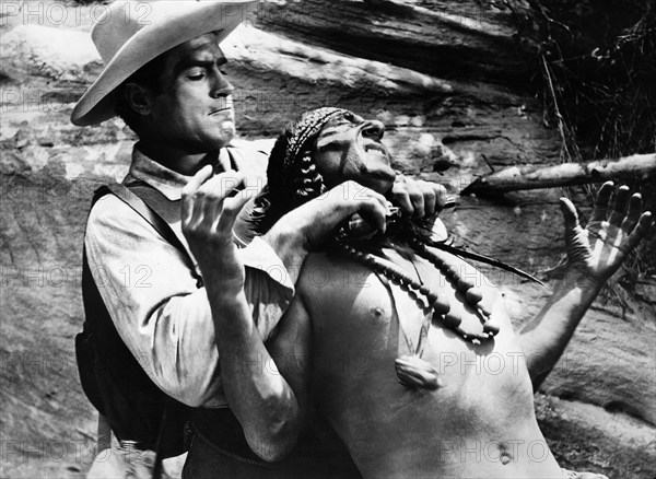 Clint Walker, on-set of the western film, "Fort Dobbs", Warner Bros., 1958