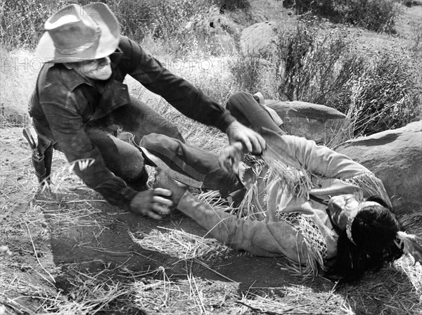 John Ireland (left), on-set of the western film, "Fort Utah", Paramount Pictures, 1967