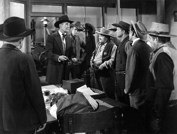 Randolph Scott, Chubby Johnson, Jack Montgomery, Walter Sande, on-set of the western film, "Fort Worth", Warner Bros., 1951