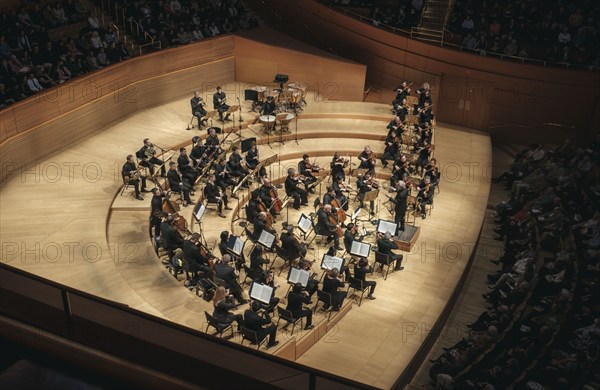 High angle view of Los Angeles Philharmonic Orchestra performing at Walt Disney Concert Hall, Los Angeles, California, USA