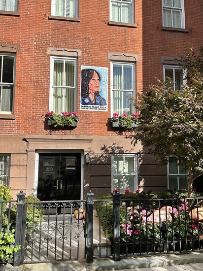 Harris Walz 2024 campaign poster on residential building, Greenwich Village, New York City, New York, USA