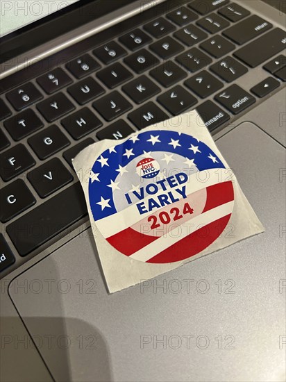 "I Voted Early 2024" sticker on laptop computer