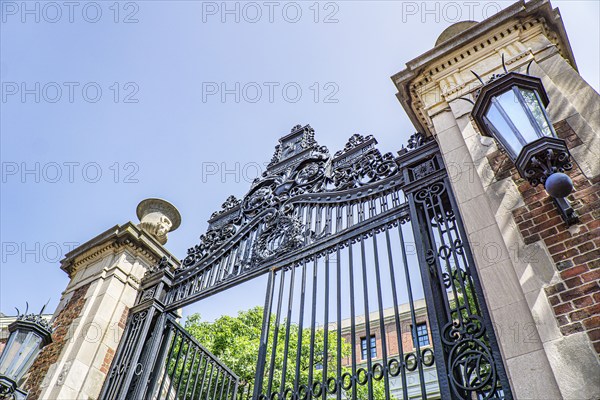 Low angle view of Morgan Gate (class of 1877) entrance to Harvard Yard, Harvard University, Cambridge, Massachusetts, USA