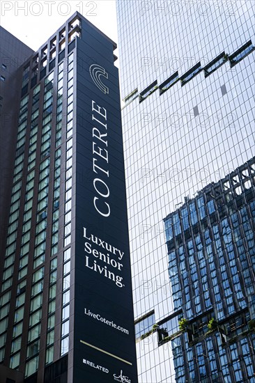 Coterie (left), a luxury senior living facility, and the Spiral (right, aka 66 Hudson Blvd.), building exterior, Hudson Yards, New York City, New York, USA