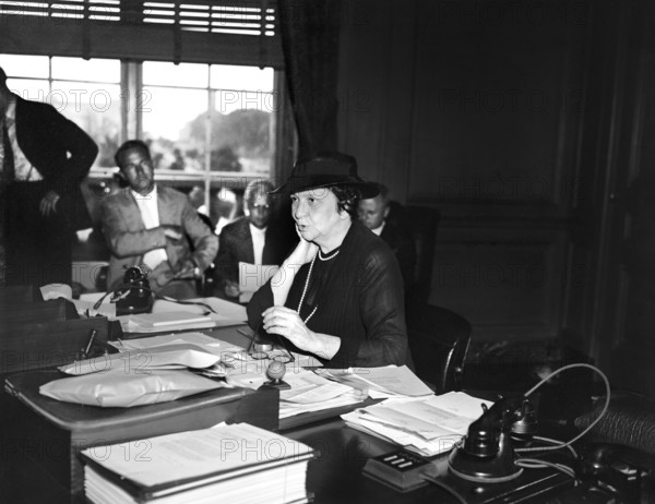 U.S. Secretary of Labor Frances Perkins announcing to the press the appointment of a three man board to mediate all current steel disputes, Washington, D.C.,. USA, Harris & Ewing, June 17, 1937